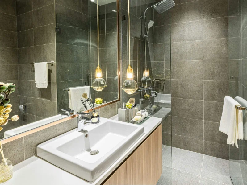 Modern glass shower and bathroom serviced by Shower Masters